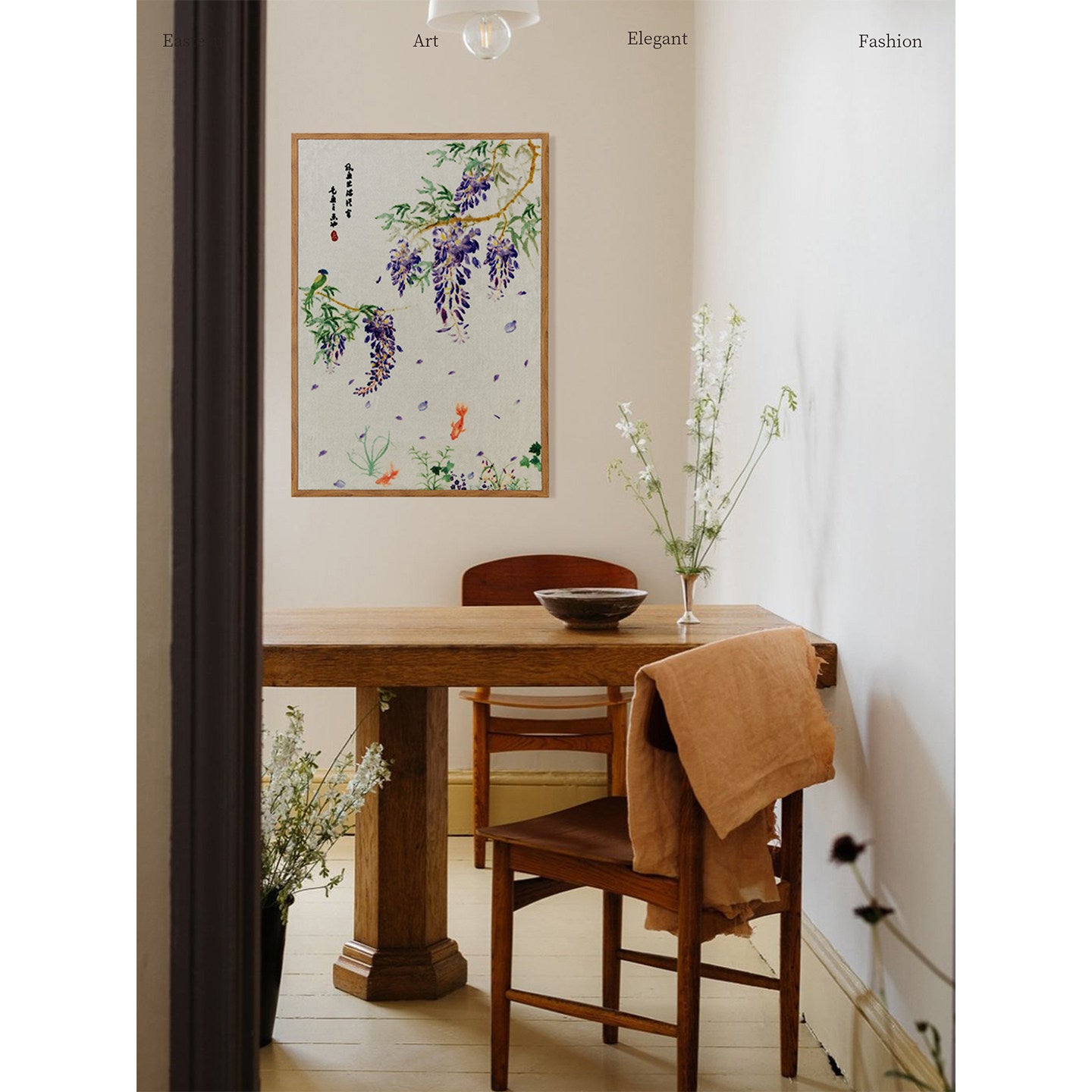 Dining room with wooden table and chairs, floral painting on the wall, and decorative elements.