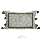 Decorative pillow with tassels on a white background, featuring the Beacon brand.