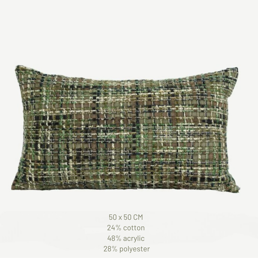 Textured green pillow with Beacon logo on a white background