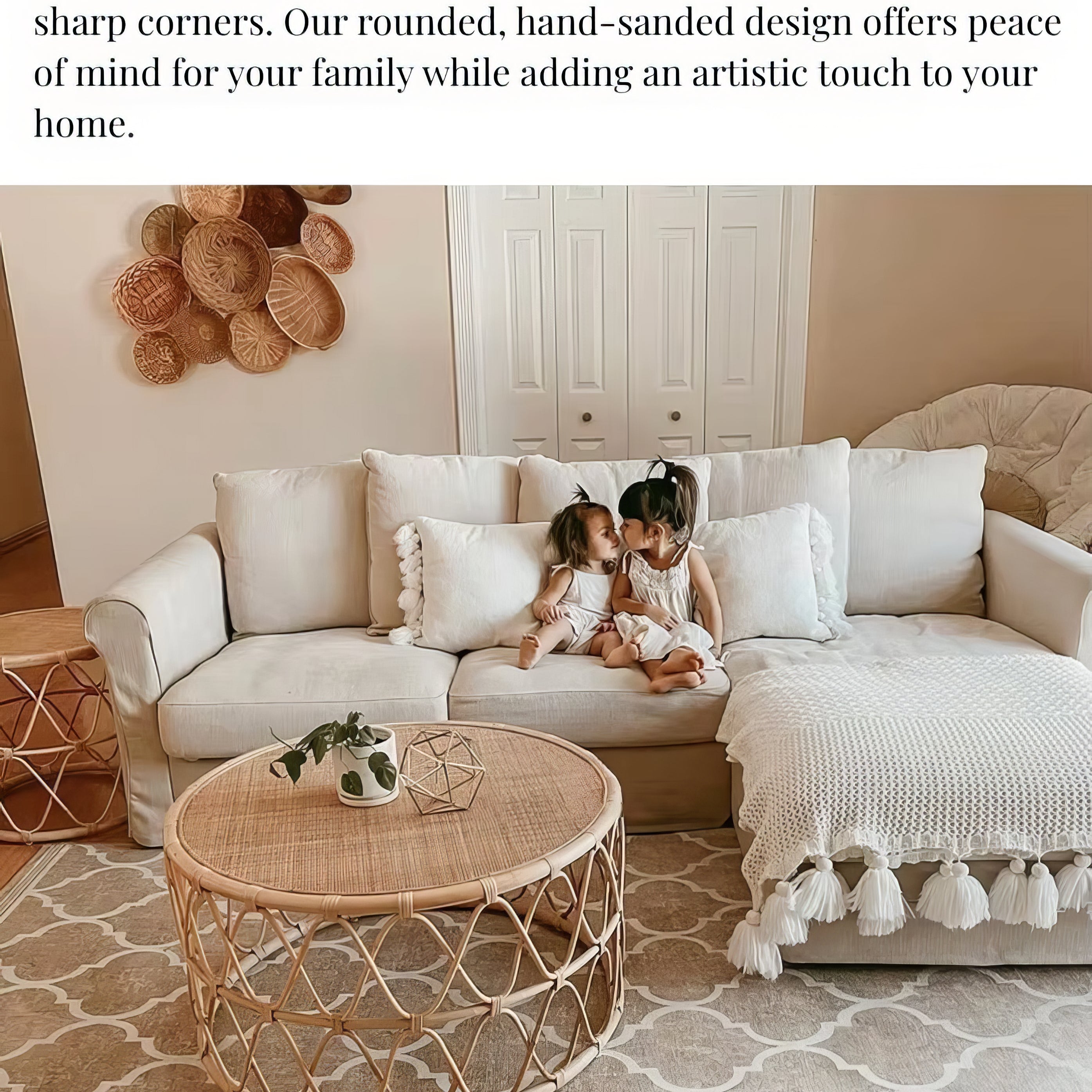 Children sitting on a white sofa with a wicker coffee table in a living room setting, featuring text about natural and non-toxic products.